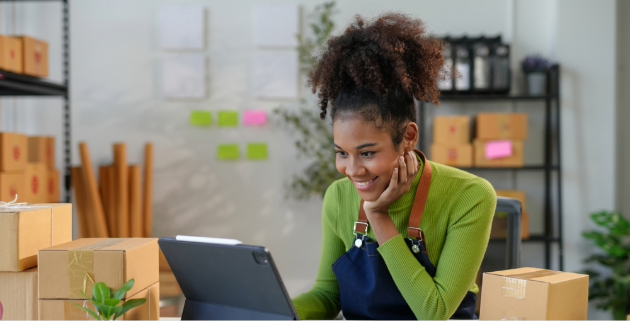 business owner looking at tablet