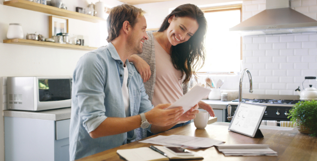 couple sitting at kitchen island